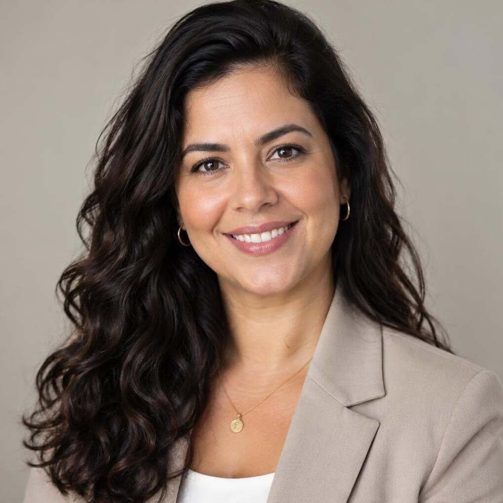 Portrait of a smiling Brazilian woman in business casual clothes