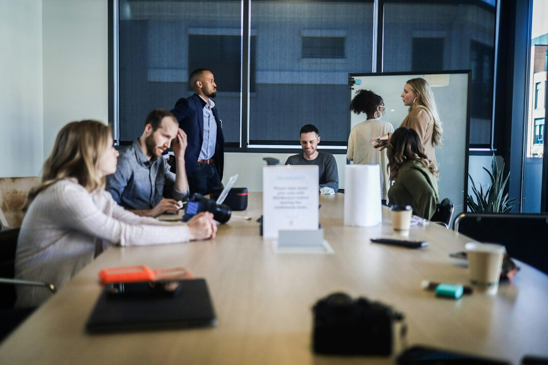 team discussing ideas in meeting