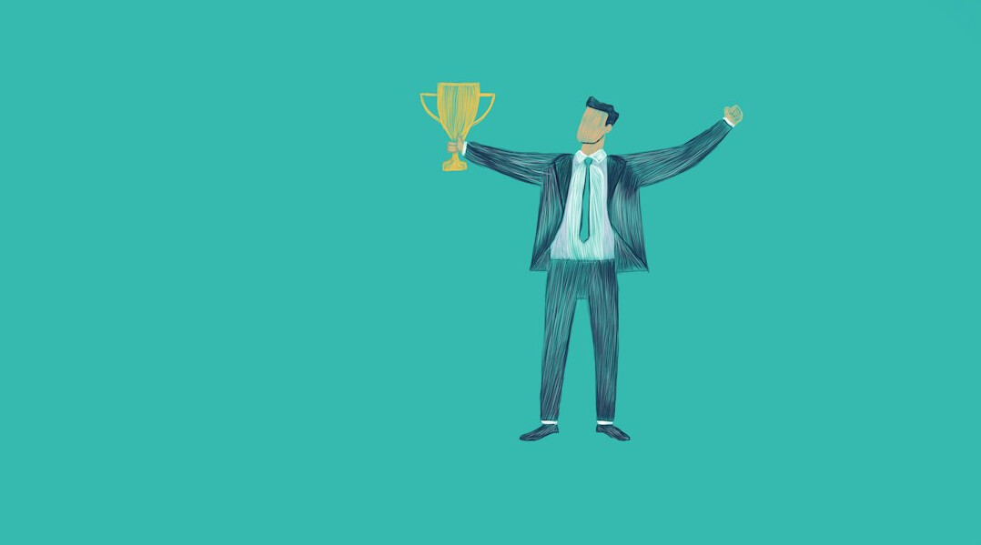 man achieving success climbing mountain
